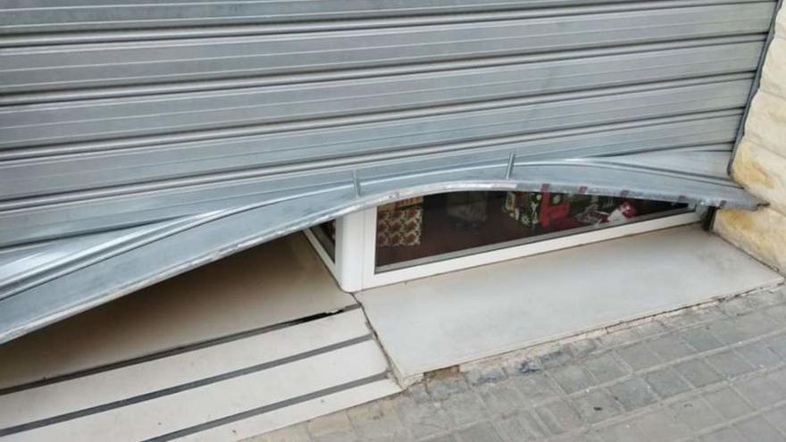 Shutter forced open